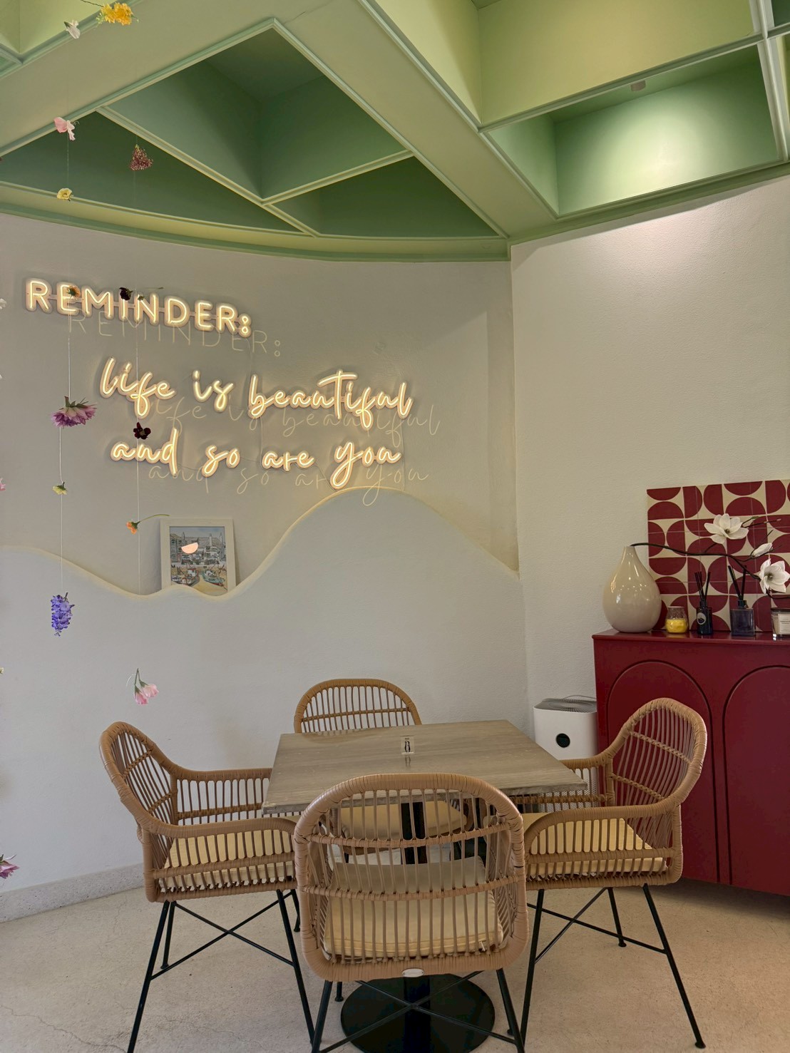 Neon sign reading 'Life is beautiful and so are you'