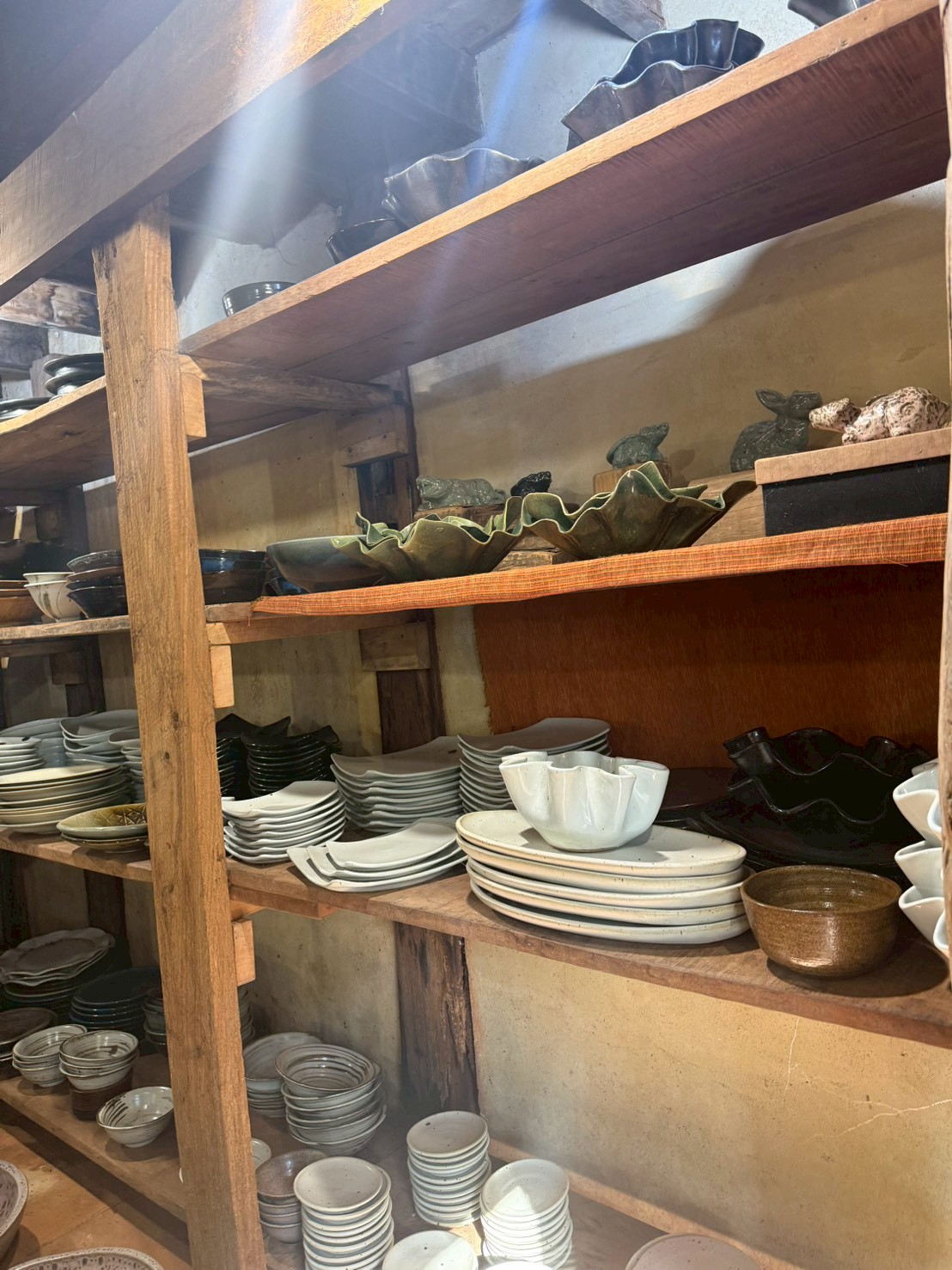 Stacked plates and bowls, ready to find a home